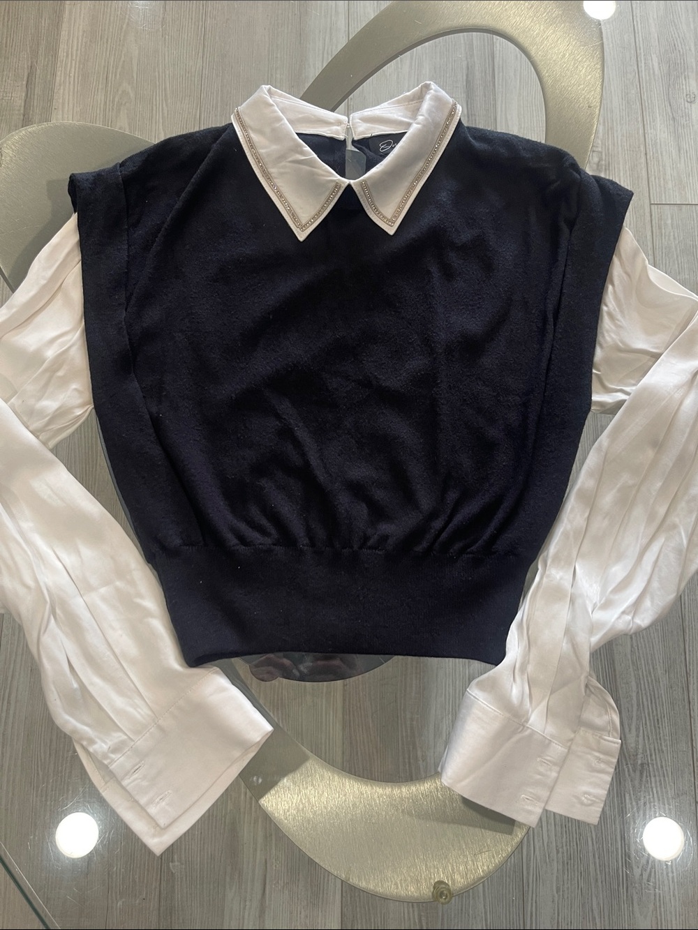 Layered Black Knit Shell with White Collared Blouse